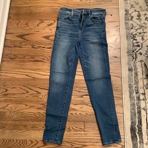 High-waisted blue jeans
